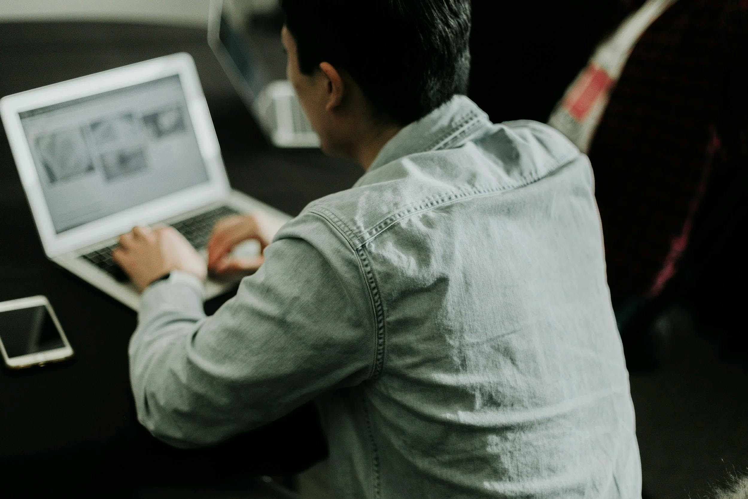 Person focusing on work with ADHD treatment support